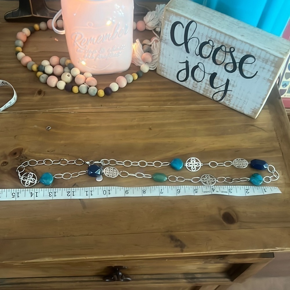 Necklace. Turquoise colored variety of beads. 13 inches long.